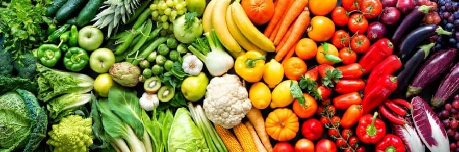 Fruits and vegetables in rainbow colors.