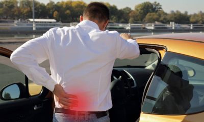 Back pain due to bad posture while driving.